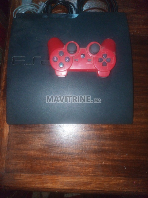 PS3 flashé + manette + jeux