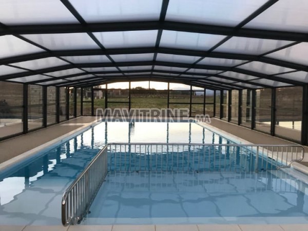 Abri de piscine retractable